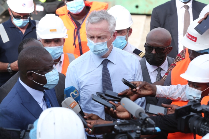 Le Ministre Français Bruno LE MAIRE visite les travaux du pont Félix HOUPHOUËT-BOIGNY / Le DG du FER aux côtés du Ministre Amédé Koffi KOUAKOU